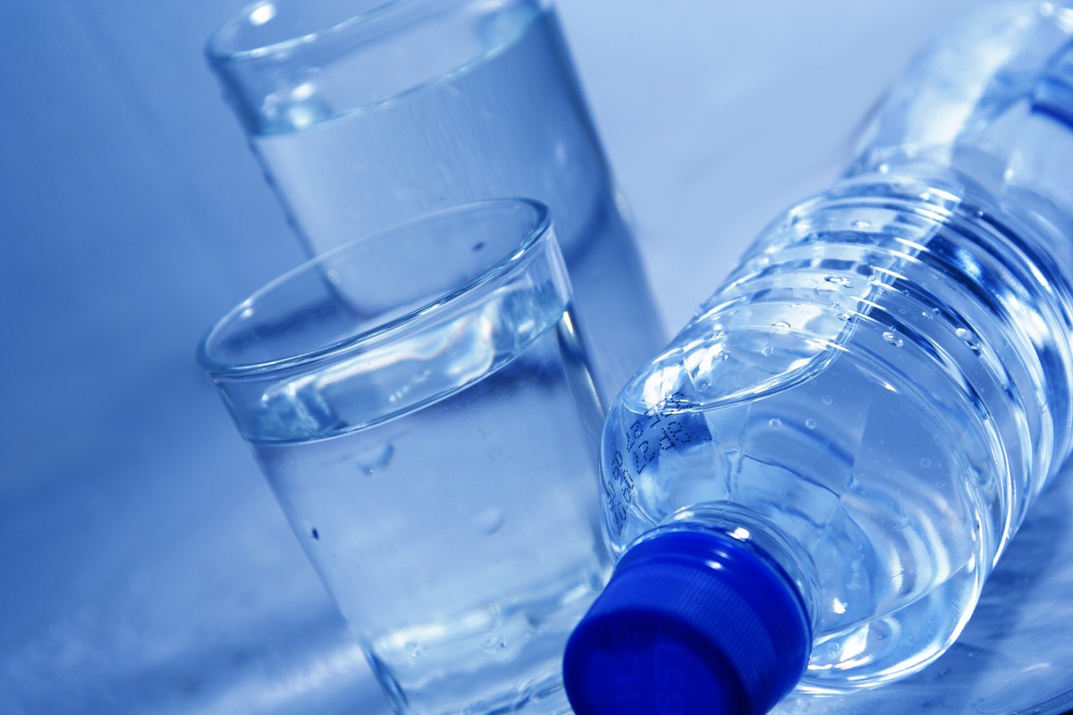 Bottle and glasses of mineral water