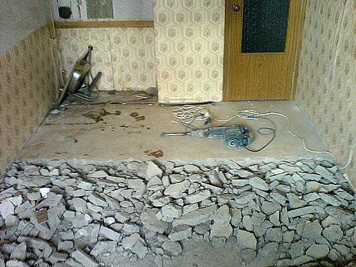 Демонтаж напольной стяжки